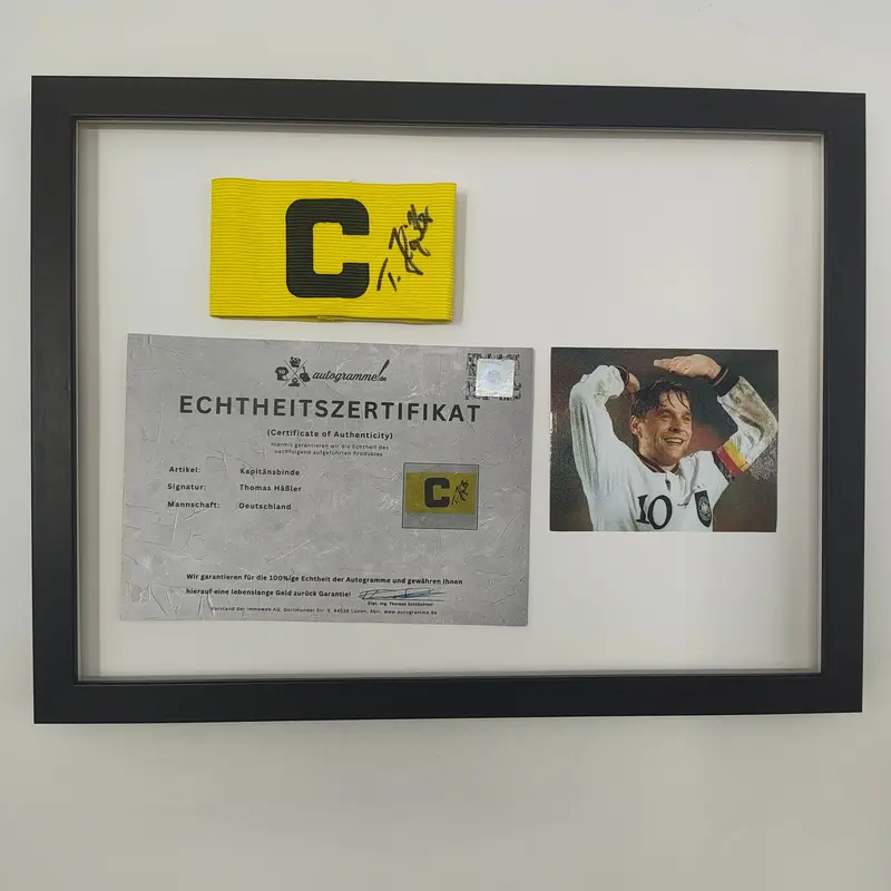 Kapitänsbinde Thomas Häßler signiert im Rahmen DFB Fußball Autogramm COA